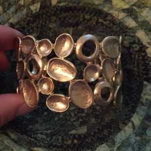 Costume jewelry gold bangle bracelet